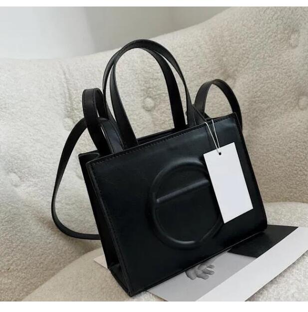 Telr bag shopping bag PU handbag women's fashion one shoulder messenger tote bagT00869
Telr bag shopping bag PU handbag women's fashion one shoulder messenger tote bagT00869