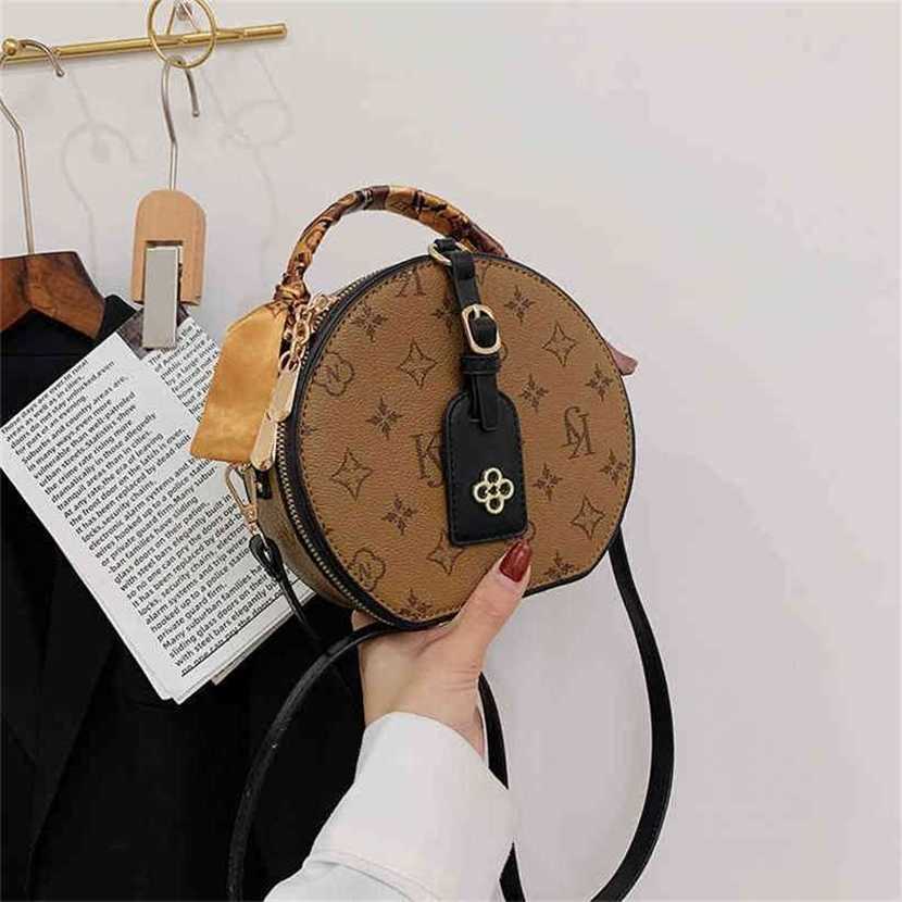 handbag 2023 Fashion women's bag leather quality Handbag female style old flower round cake Shoulder Messenger women's portable Korean online Red Bag, Khaki5
handbag 2023 Fashion women's bag leather quality Handbag female style old flower round cake Shoulder Messenger women's portable Korean online Red Bag, Khaki5