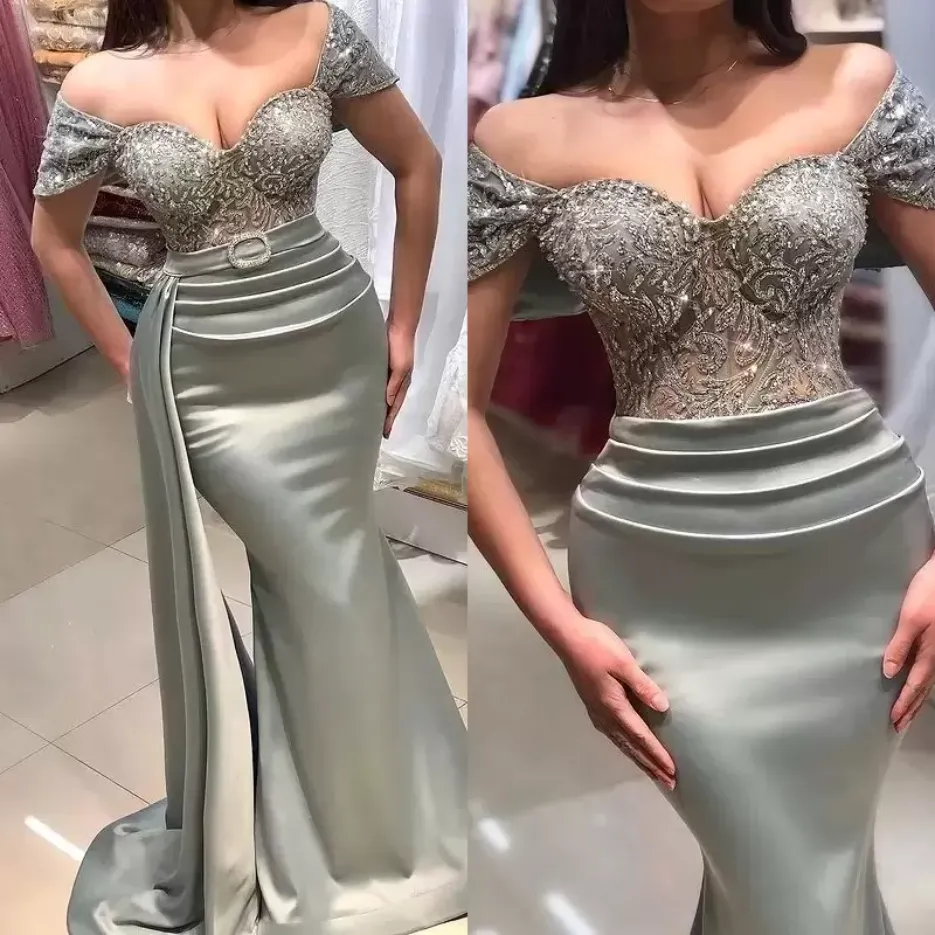 2023 Silver Mermaid Bridesmaid Dresses Off the Shoulder Beaded with Detachable Train Satin Sleeveless Strap Ruched Custom Made Plus Size Maid of Honor Gowns Vestido
2023 Silver Mermaid Bridesmaid Dresses Off the Shoulder Beaded with Detachable Train Satin Sleeveless Strap Ruched Custom Made Plus Size Maid of Honor Gowns Vestido