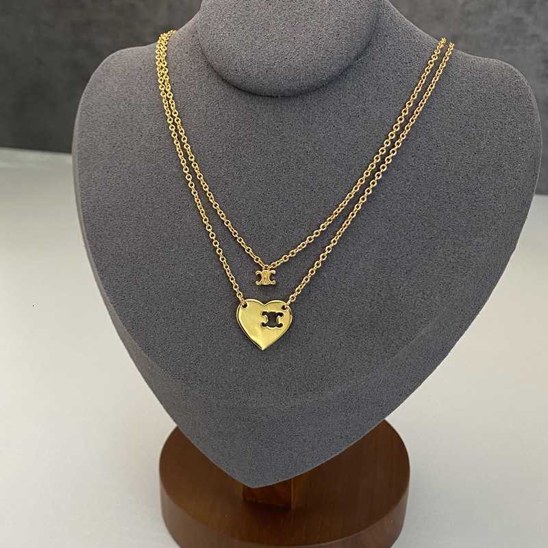 Brand necklace 2022 new classic triumphal arch double-layer love pendant bracelet light luxury high sense clavicle chain
Brand necklace 2022 new classic triumphal arch double-layer love pendant bracelet light luxury high sense clavicle chain