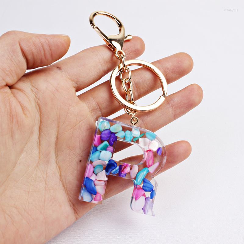 Keychains Fashion Letter A-Z Purple Rainbow Acrylic Keychain Gold Plated Stone Beads Keyring Personality Resin Handbag Car Key Ring Decor
Keychains Fashion Letter A-Z Purple Rainbow Acrylic Keychain Gold Plated Stone Beads Keyring Personality Resin Handbag Car Key Ring Decor