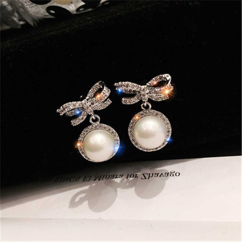 Dangle Chandelier Small Bow Pearl Earrings Short Temperament South Korea East Gate Fashion Net Red Earrings Small Fresh Silver Needle Earrings G230313
Dangle Chandelier Small Bow Pearl Earrings Short Temperament South Korea East Gate Fashion Net Red Earrings Small Fresh Silver Needle Earrings G230313