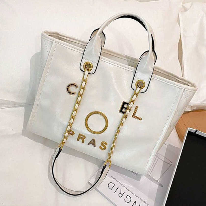 Luxury Handbags Ch Women's Fashion Beach Bags Designers Metal Pearl Letter Badge Tote Evening Bag Small Mini Leather Handbag Large Chain Wallet Bac Tser
Luxury Handbags Ch Women's Fashion Beach Bags Designers Metal Pearl Letter Badge Tote Evening Bag Small Mini Leather Handbag Large Chain Wallet Bac Tser