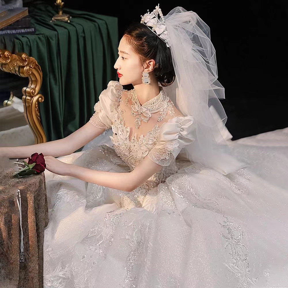 2023 Arabic Wedding Dresses Sweetheart Satin short sleeve Vintage Sashes Ruched Sexy Open Back huge ball gown crystal beaded bgbg Bridal Gowns