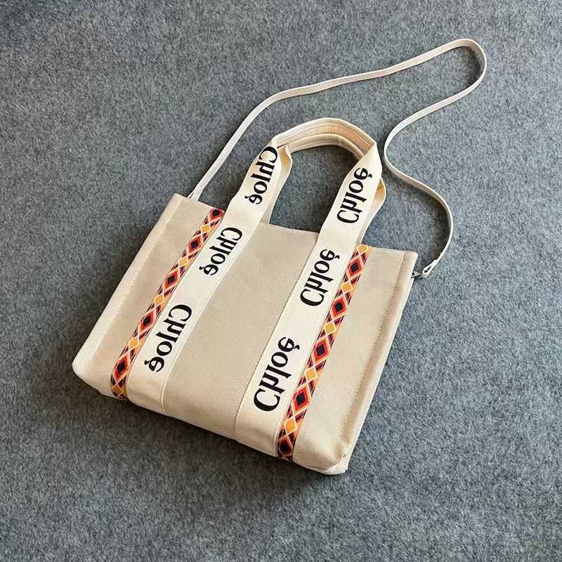 woody Designer Tote Bag Single-shoulder Ins Letters New Canvas High Small Design Quality Portable Korean Large Capacity Women's PF1U
woody Designer Tote Bag Single-shoulder Ins Letters New Canvas High Small Design Quality Portable Korean Large Capacity Women's PF1U