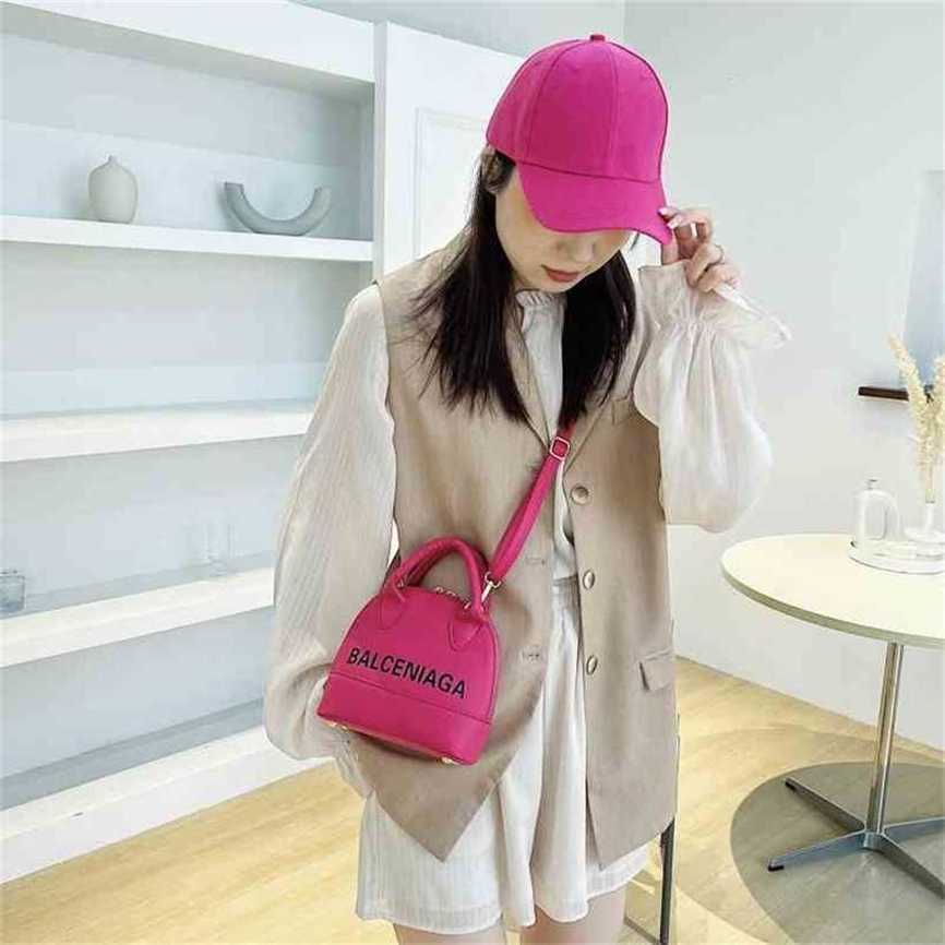 handbag 2023 Fashion women's bag leather quality Handbag Women's Hot women simple letter printing candy color hand-held exotic shell Bag, White12
handbag 2023 Fashion women's bag leather quality Handbag Women's Hot women simple letter printing candy color hand-held exotic shell Bag, White12