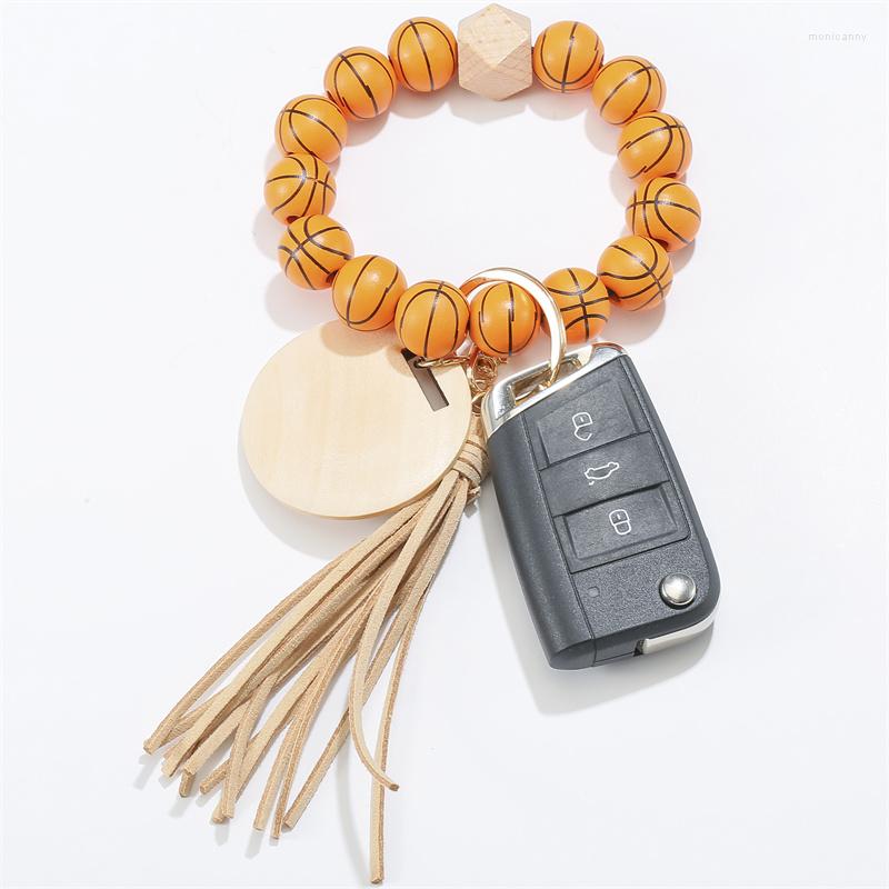 Keychains Football Basketball Wood Beaded Bracelet Keychain For Women Men Tassel Pendant Keyring Jewelry Accessories
Keychains Football Basketball Wood Beaded Bracelet Keychain For Women Men Tassel Pendant Keyring Jewelry Accessories