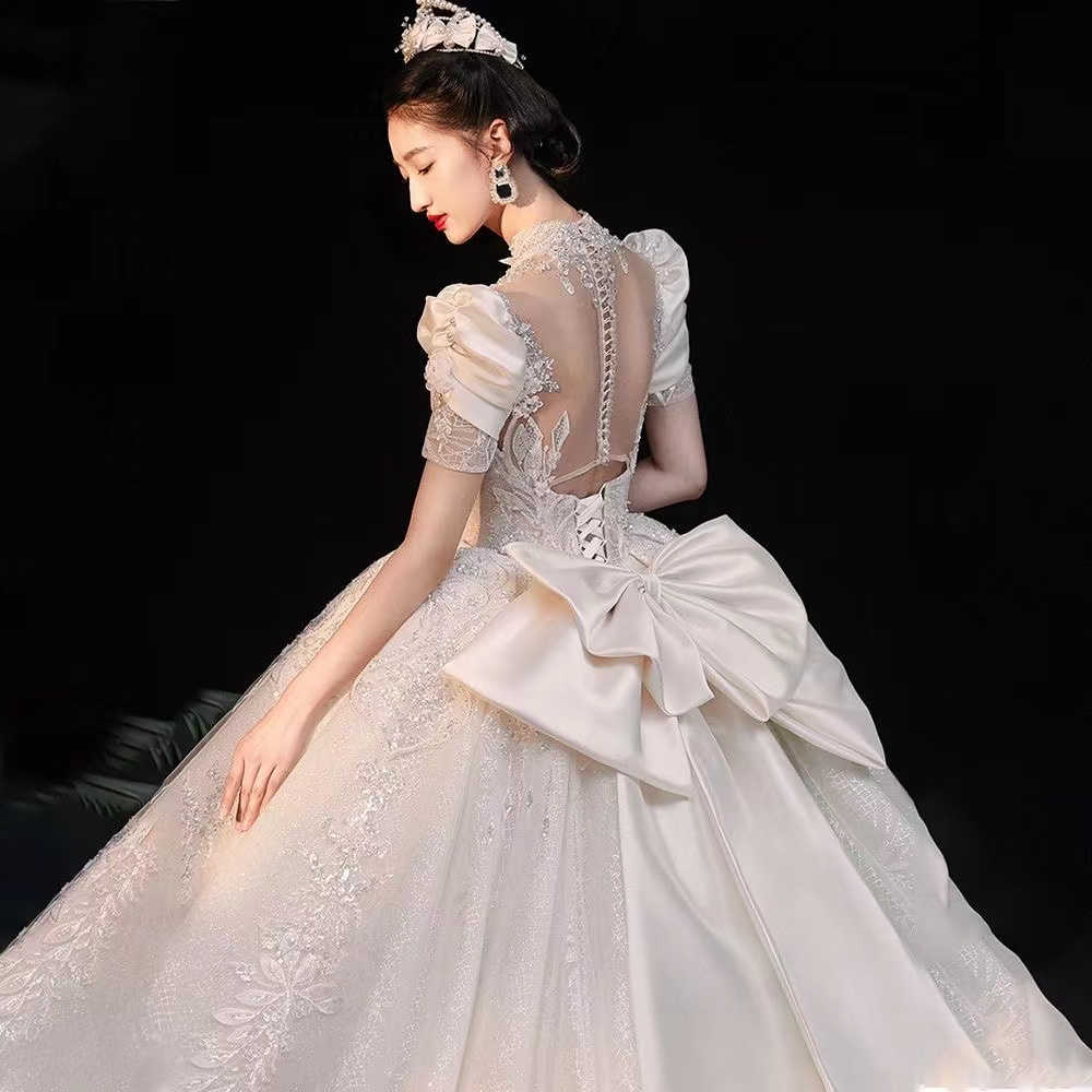 2023 Arabic Wedding Dresses Sweetheart Satin short sleeve Vintage Sashes Ruched Sexy Open Back huge ball gown crystal beaded bgbg Bridal Gowns