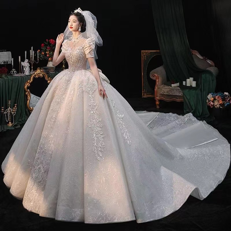 2023 Arabic Wedding Dresses Sweetheart Satin short sleeve Vintage Sashes Ruched Sexy Open Back huge ball gown crystal beaded bgbg Bridal Gowns