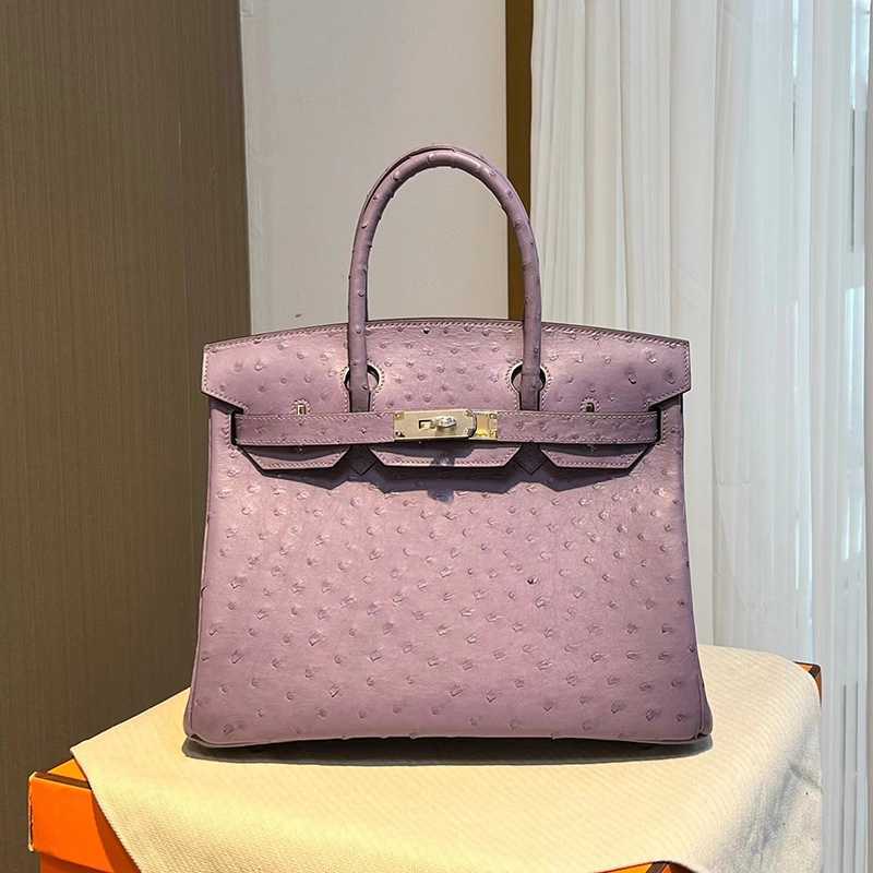 Luxury Bag Birkin Lavender purple ostrich skin silver button manual sewing BK 30CM high-end women's H home with logo
Luxury Bag Birkin Lavender purple ostrich skin silver button manual sewing BK 30CM high-end women's H home with logo