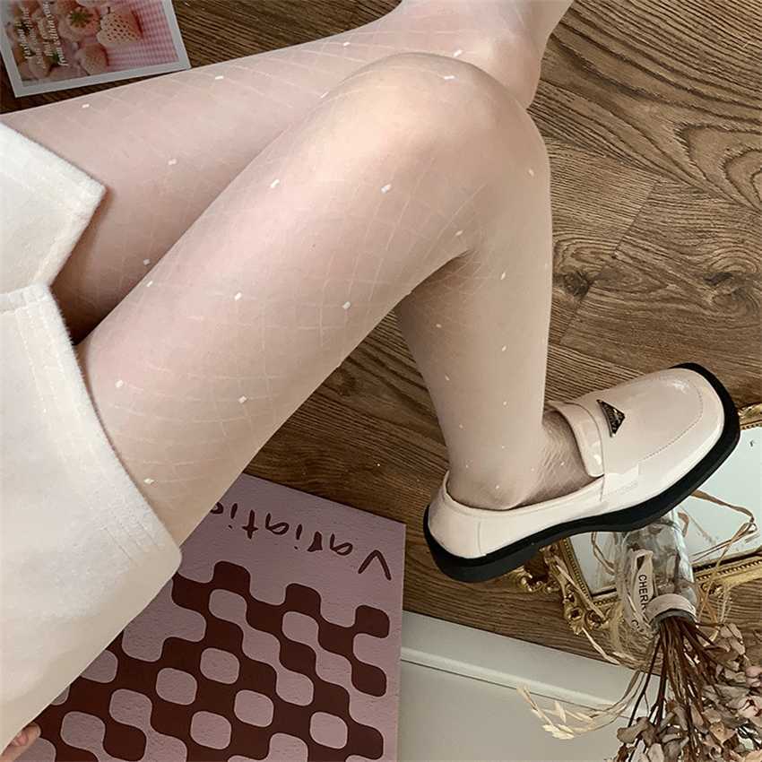 Pure lust sweet creamy white ultra-thin cored wire small mesh jade dots jacquard stockings Lolita JK, Black 
Pure lust sweet creamy white ultra-thin cored wire small mesh jade dots jacquard stockings Lolita JK, Black