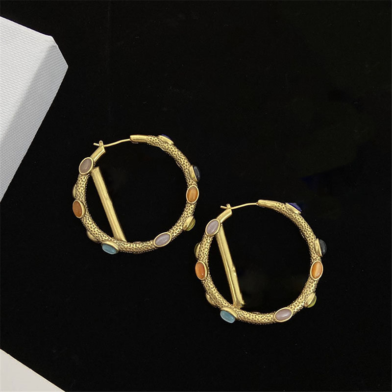 Colored Stone Charm for Women Grainy Hollow Circle Ear Stud Lady Geometry Design Earrings
Colored Stone Charm for Women Grainy Hollow Circle Ear Stud Lady Geometry Design Earrings