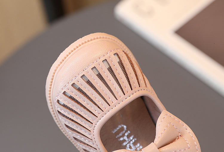 First Walkers Baby Girls Walking Shoes Hollowed-out Solid Color Bow PU Lovely Breathable Shallow Kids Leather Shoes Children Flats 230314