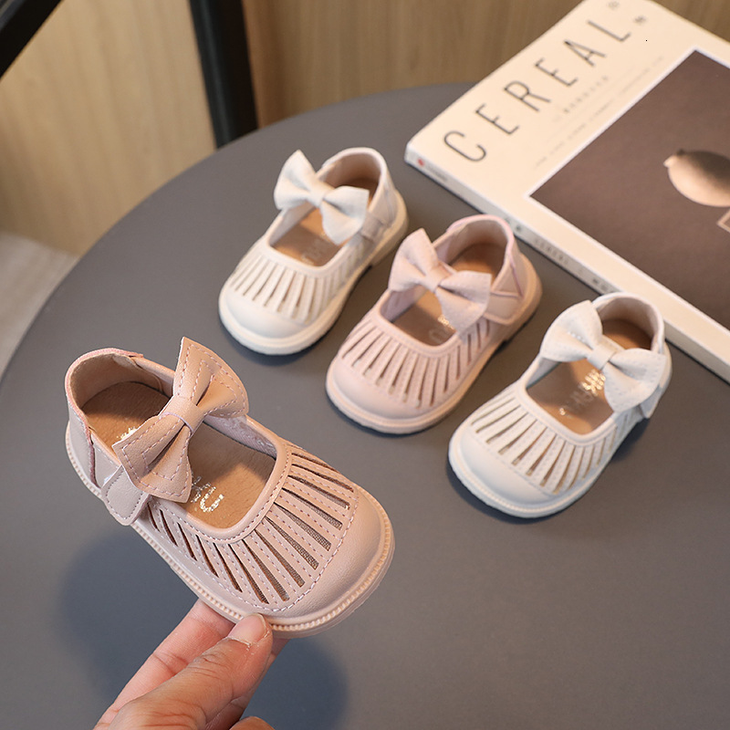 First Walkers Baby Girls Walking Shoes Hollowed-out Solid Color Bow PU Lovely Breathable Shallow Kids Leather Shoes Children Flats 230314