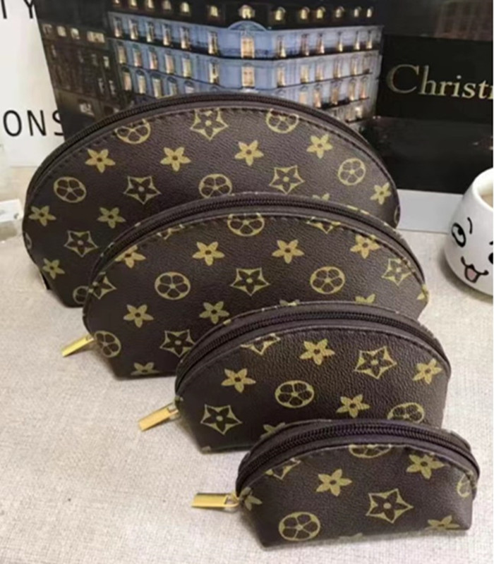 2022 fashion Women Designer cosmetic bags organizer famous makeup bag travel pouch make up ladies cluch purses organizador toiletry 4pcs set, Multi
2022 fashion Women Designer cosmetic bags organizer famous makeup bag travel pouch make up ladies cluch purses organizador toiletry 4pcs set, Multi