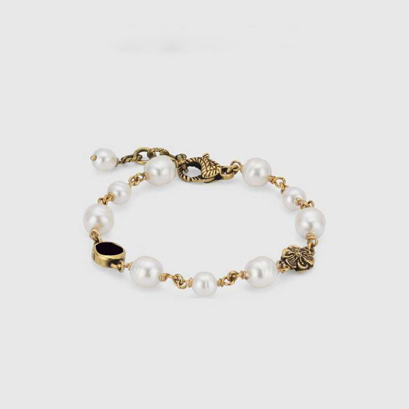 new design brass bracelet chain pearl band flower gletter bracelets for womens versatile fashion bracelet designer jewelry 1g1
new design brass bracelet chain pearl band flower gletter bracelets for womens versatile fashion bracelet designer jewelry 1g1