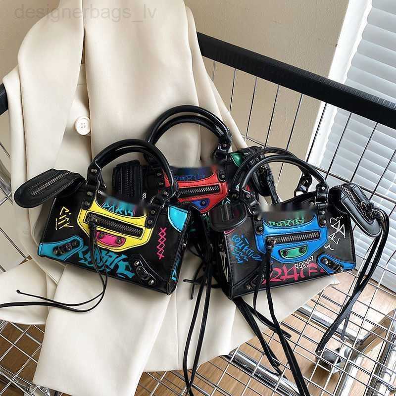 B bag le cagole motorcycle popular Ins locomotive bag net red graffiti bag female hot girl super handsome shoulder bag small square bag messenger bag, Blue
B bag le cagole motorcycle popular Ins locomotive bag net red graffiti bag female hot girl super handsome shoulder bag small square bag messenger bag, Blue