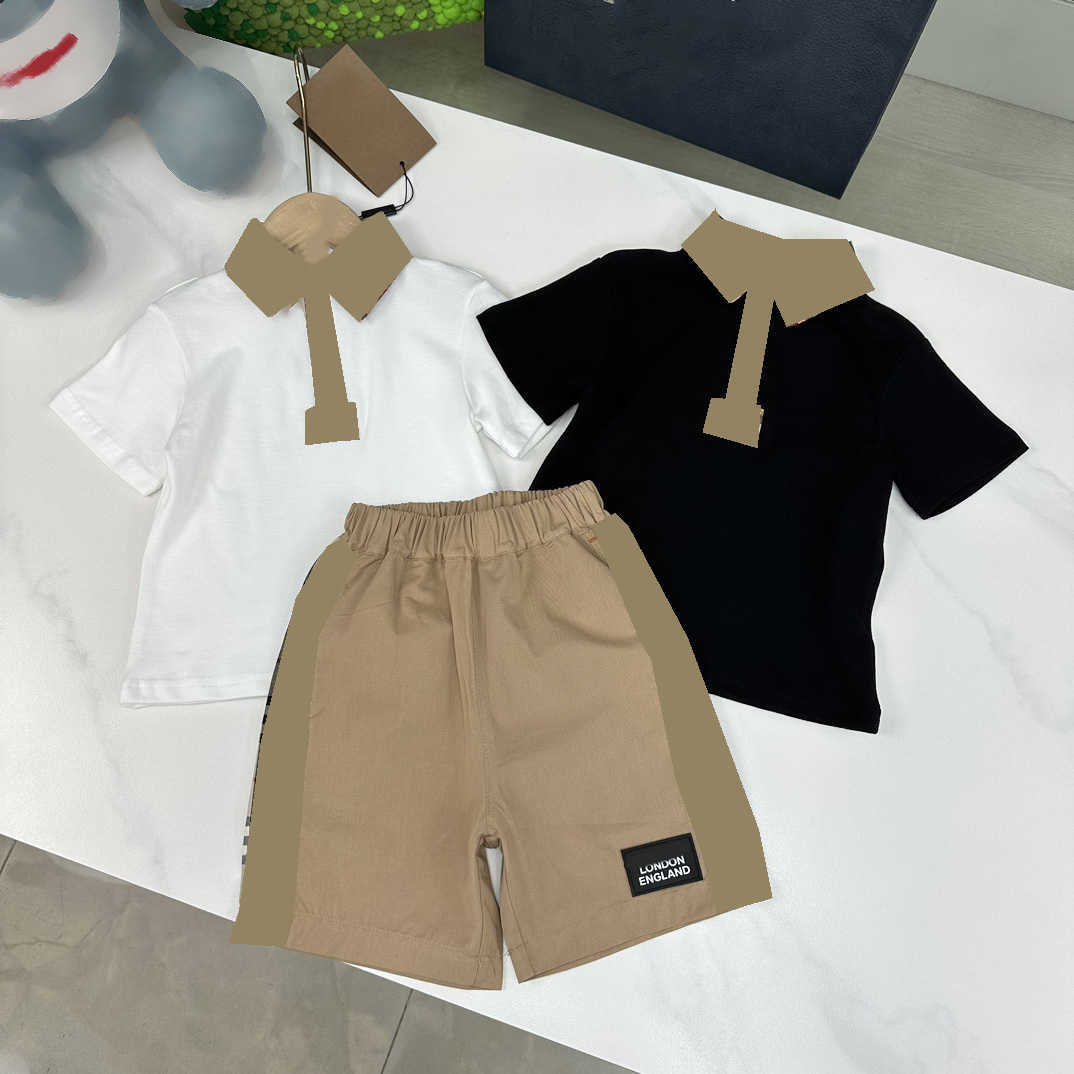 23ss designer kids brand polo shirt shorts set boys lattice lapel Little fresh preppy short sleeves Shorts two-piece High quality kid clothing
23ss designer kids brand polo shirt shorts set boys lattice lapel Little fresh preppy short sleeves Shorts two-piece High quality kid clothing