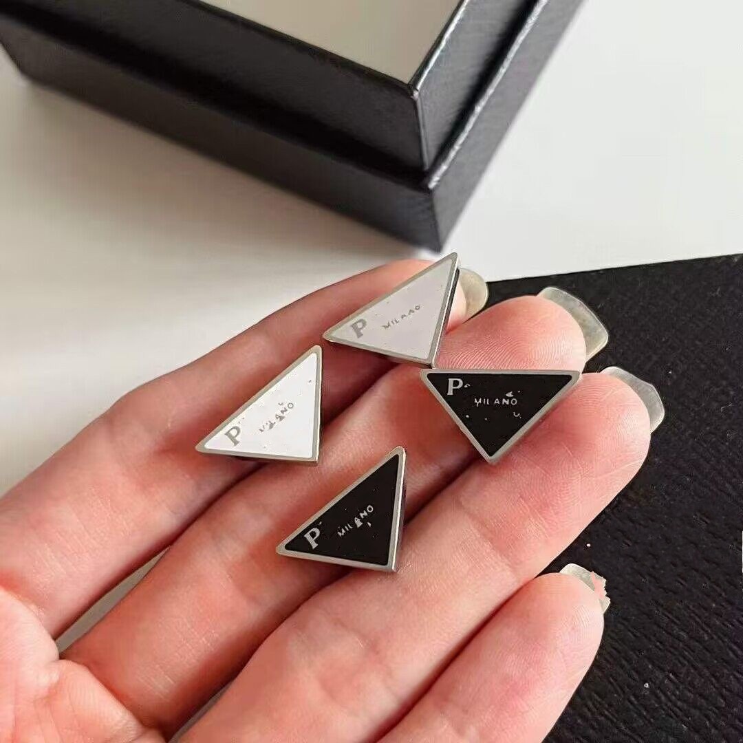 Tri-angle symbole design black white stud women men letter logo engrave dangle earrings girls wedding jewelry s925 silver needle
Tri-angle symbole design black white stud women men letter logo engrave dangle earrings girls wedding jewelry s925 silver needle