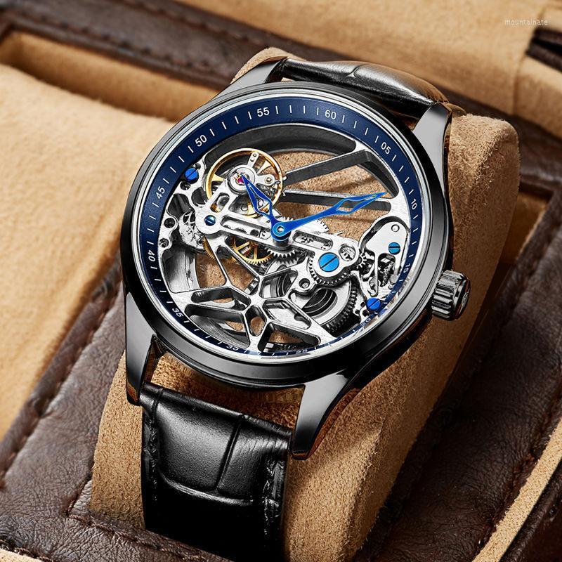 Wristwatches Hollow Design Automatic Mechanical Watch For Men Flywheel Fashion Man Leather Strap Clock Luxury Male WristwatchWristwatches Mo
Wristwatches Hollow Design Automatic Mechanical Watch For Men Flywheel Fashion Man Leather Strap Clock Luxury Male WristwatchWristwatches Mo