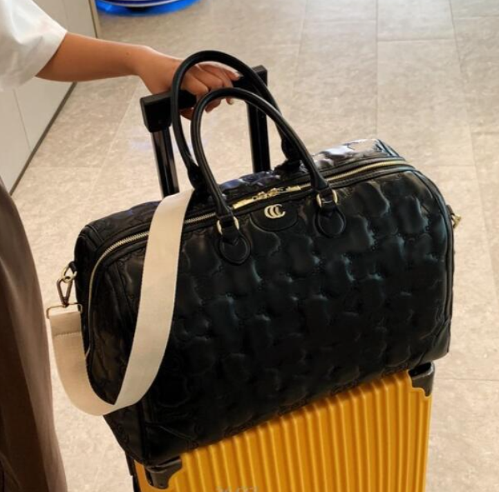 Classic Portable Women Designers Travel Bag PU Leather Larger Capacity Men Big Luggage Handbag Duffle Bags Shoulder Crossbody Outdoor travels Handbags
Classic Portable Women Designers Travel Bag PU Leather Larger Capacity Men Big Luggage Handbag Duffle Bags Shoulder Crossbody Outdoor travels Handbags