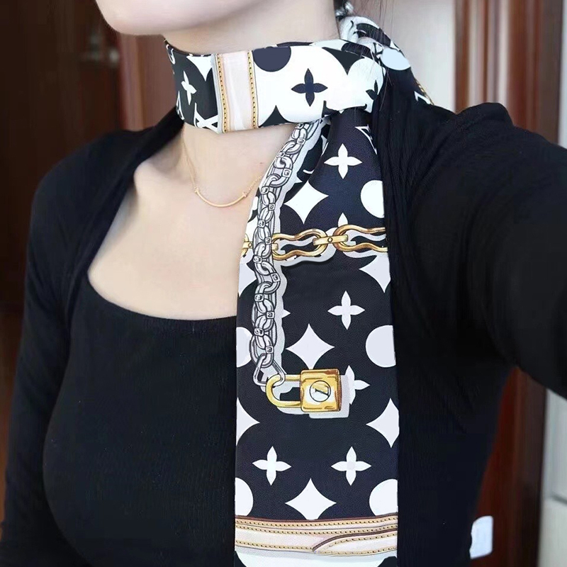 Designer L letter silk scarf headscarf women's fashion long handle bag scarf Paris shoulder backpack luggage ribbon headscarf
Designer L letter silk scarf headscarf women's fashion long handle bag scarf Paris shoulder backpack luggage ribbon headscarf