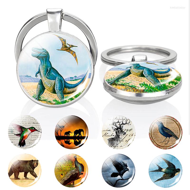 Keychains 1pc Ferocious Green Dinosaur Double Side Keychain Animals Peacock Swallow Glass Cabochon Dome Jewelry Pendant Car Key Chains
Keychains 1pc Ferocious Green Dinosaur Double Side Keychain Animals Peacock Swallow Glass Cabochon Dome Jewelry Pendant Car Key Chains