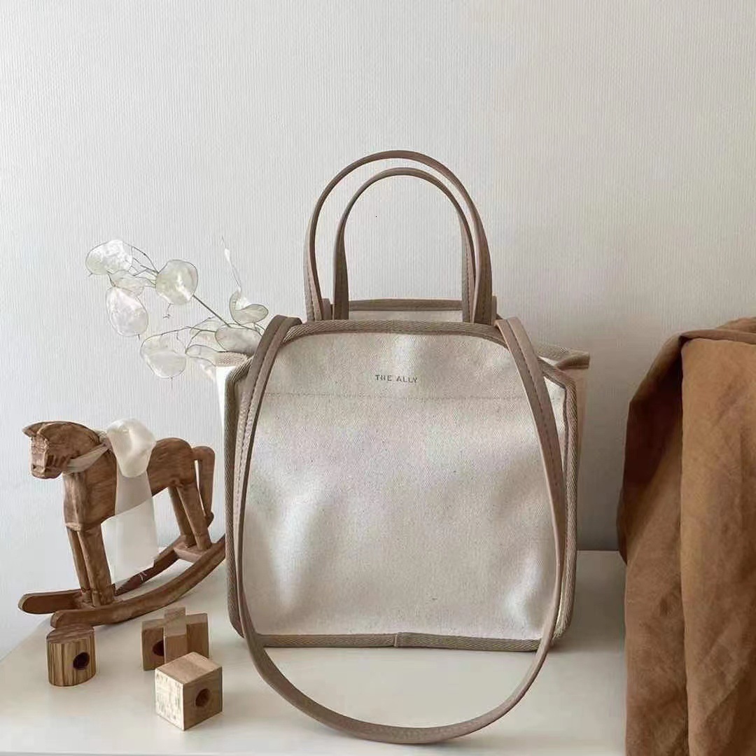 Diaper Bags Embroidered Bear Mummy Bag Oversized Bento Canvas Handbag Retro Portable Shoulder Bag Small Zipper Cosmetic Bag 2pcs 230316, Beige
Diaper Bags Embroidered Bear Mummy Bag Oversized Bento Canvas Handbag Retro Portable Shoulder Bag Small Zipper Cosmetic Bag 2pcs 230316, Beige