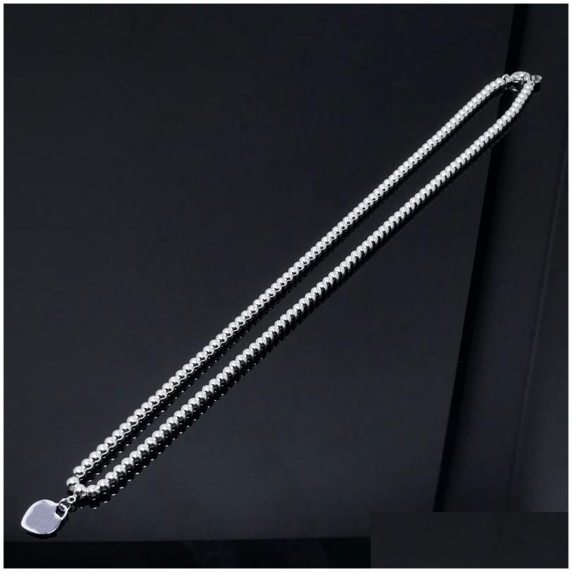 Bracelet Necklace Women Luxury Love Designer Jewelry Fashion Circle 925 Sier Bracelets Heart Pendant Necklaces Chains Link Dhnyu, White
Bracelet Necklace Women Luxury Love Designer Jewelry Fashion Circle 925 Sier Bracelets Heart Pendant Necklaces Chains Link Dhnyu, White
