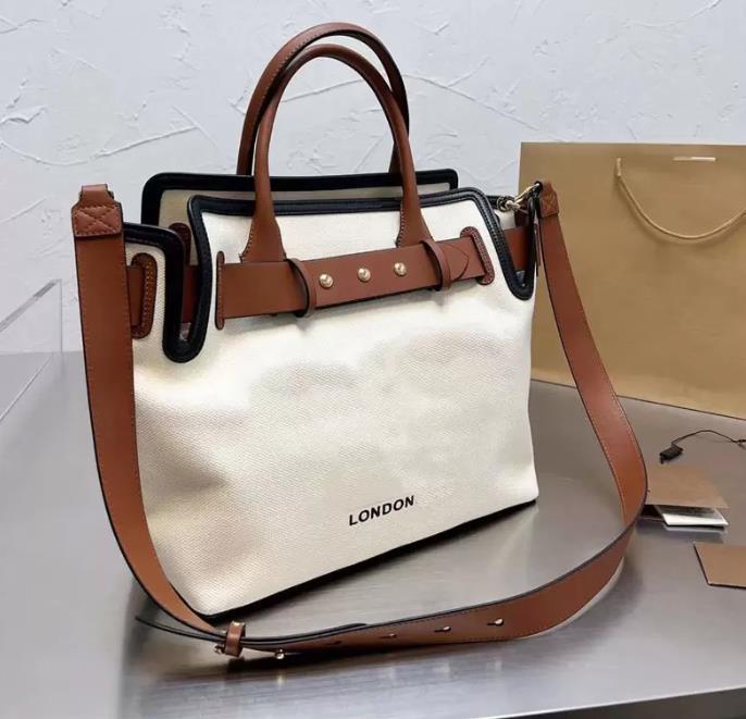 Designer TotASwomen Canvas Handbag Purse Large Capacity Package Lady TotAe Bags Shopping Bag High Quality Fashion Shoulder Bag
Designer TotASwomen Canvas Handbag Purse Large Capacity Package Lady TotAe Bags Shopping Bag High Quality Fashion Shoulder Bag