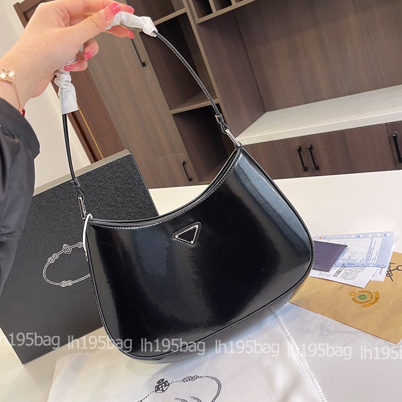 Triangle Prad hobo Bag Designer Handbag Lady's Triangle Symbolizes The Luxury Leather Fashion Handbag Messenger Handbag Shoulder Sling Bags Size: 31*23cm, Black 31*23cm
Triangle Prad hobo Bag Designer Handbag Lady's Triangle Symbolizes The Luxury Leather Fashion Handbag Messenger Handbag Shoulder Sling Bags Size: 31*23cm, Black 31*23cm