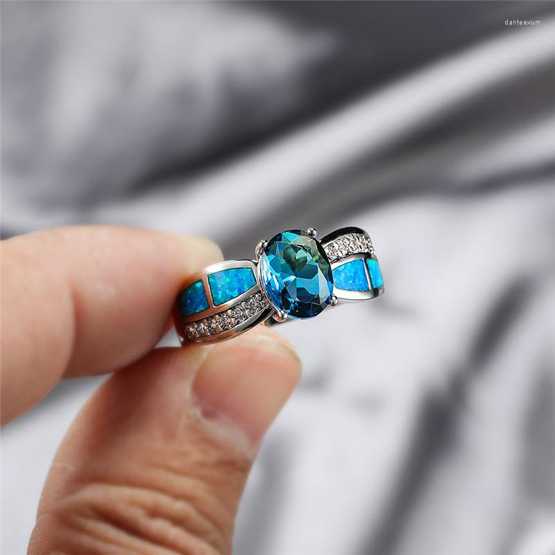 Wedding Rings White Blue Opal Engagement Ring Rainbow Crystal Multicolor Zircon Oval Stone Classic Silver Color For Women
Wedding Rings White Blue Opal Engagement Ring Rainbow Crystal Multicolor Zircon Oval Stone Classic Silver Color For Women