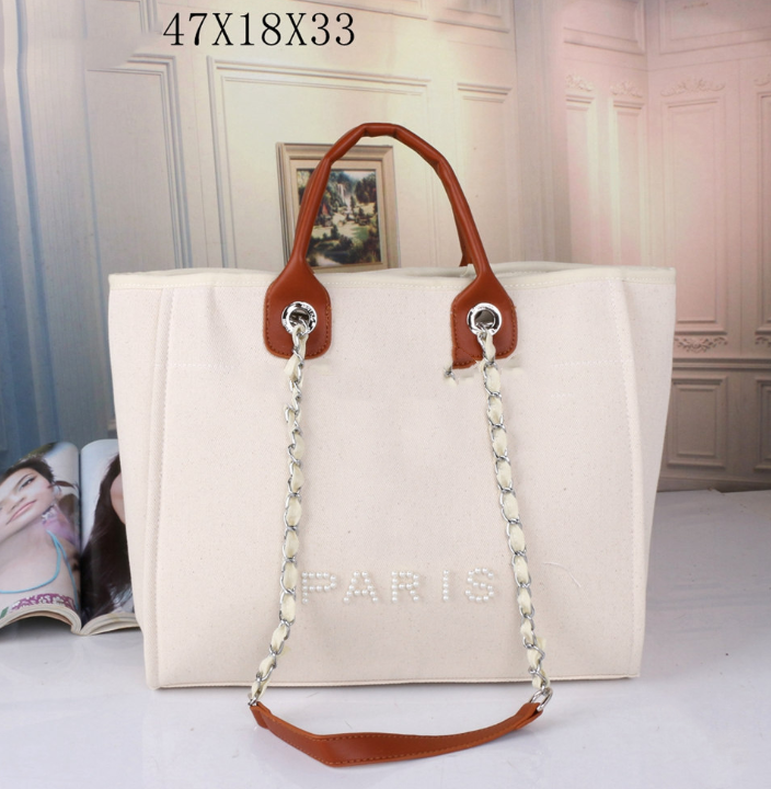 Fashion Handbag Women's beach designer Oblique Skill Handbag shoulder embroidery large capacity embroidery shopping Tote, 47*18*33cm
Fashion Handbag Women's beach designer Oblique Skill Handbag shoulder embroidery large capacity embroidery shopping Tote, 47*18*33cm