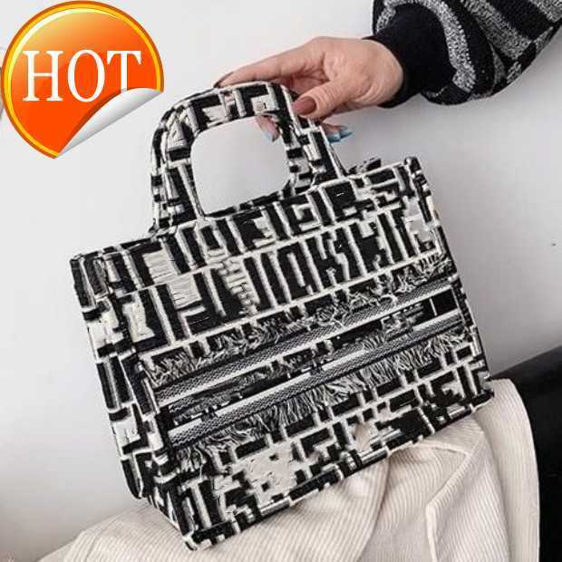 Luxury Brand Designer bags Hand Shoulder Crossbody Bag Tote 2023 New Women's Fashion Embroidery Shopping Leisure Large Open Korean Canvas Factory direct sales, Black trumpet
Luxury Brand Designer bags Hand Shoulder Crossbody Bag Tote 2023 New Women's Fashion Embroidery Shopping Leisure Large Open Korean Canvas Factory direct sales, Black trumpet