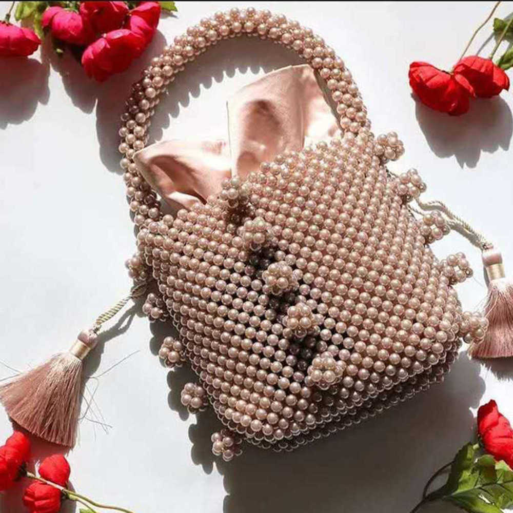 plum blossom pearl bag Beautiful lady portable tassel fashion Pink fairy pig nose 230304, Any color can be customized
plum blossom pearl bag Beautiful lady portable tassel fashion Pink fairy pig nose 230304, Any color can be customized