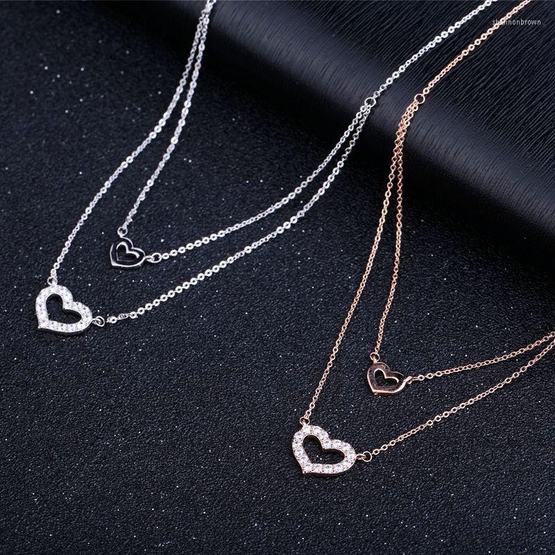 Pendant Necklaces Love Charm Necklace Brazil Style Colar CZ Paved Heart Double Layers For Women Collar Accessories Bijoux Wedding
Pendant Necklaces Love Charm Necklace Brazil Style Colar CZ Paved Heart Double Layers For Women Collar Accessories Bijoux Wedding