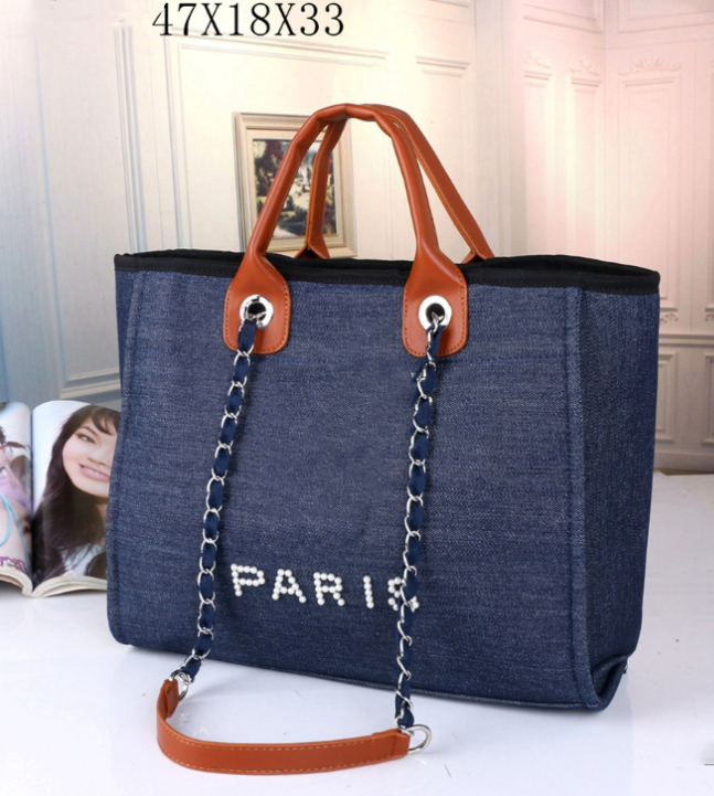 Quality luxury Handbag Women's beach designer Oblique Skill Handbag shoulder embroidery large capacity embroidery shopping Tote, 47*18*33cm
Quality luxury Handbag Women's beach designer Oblique Skill Handbag shoulder embroidery large capacity embroidery shopping Tote, 47*18*33cm