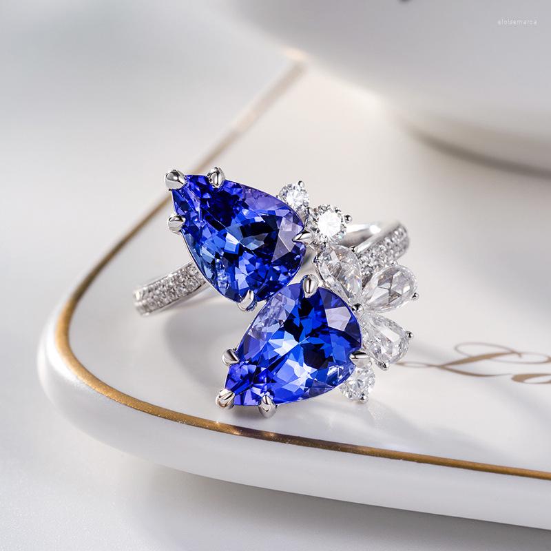 Wedding Rings Europe America Silvery Geometry Ring Inlay Blue Water Drop Cubic Zirocnia Elegant Temperament Women Engagement Gifts
Wedding Rings Europe America Silvery Geometry Ring Inlay Blue Water Drop Cubic Zirocnia Elegant Temperament Women Engagement Gifts