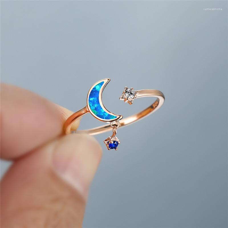 Wedding Rings White Blue Opal Crystal Stone Engagement Ring Cute Female Star Moon Pendant Vintage Rose Gold Color Opening For Women
Wedding Rings White Blue Opal Crystal Stone Engagement Ring Cute Female Star Moon Pendant Vintage Rose Gold Color Opening For Women