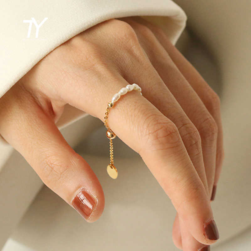 Band Rings French Simple Retro Pearl Chain Pull Adjustment Gold Color Rings Girl's New Elegant Accessories Fashion Finger Jewelry For Woman G230317
Band Rings French Simple Retro Pearl Chain Pull Adjustment Gold Color Rings Girl's New Elegant Accessories Fashion Finger Jewelry For Woman G230317