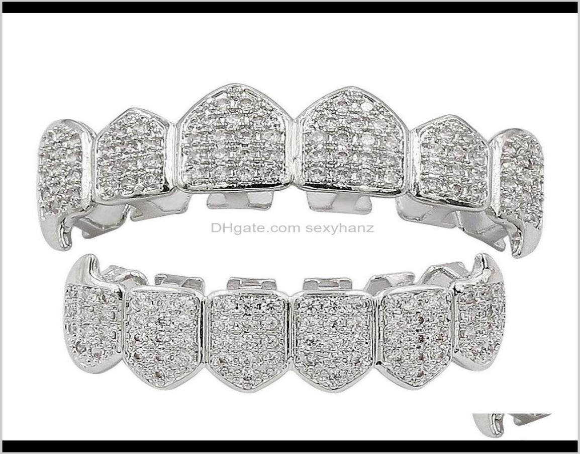 Grillz Body Drop Delivery 2021 Hip Hop Dental Grills Jewelry Luxury Men Women Grade Quality Cubic Zirconia Paved Vampire Teeth Bra5985454
Grillz Body Drop Delivery 2021 Hip Hop Dental Grills Jewelry Luxury Men Women Grade Quality Cubic Zirconia Paved Vampire Teeth Bra5985454