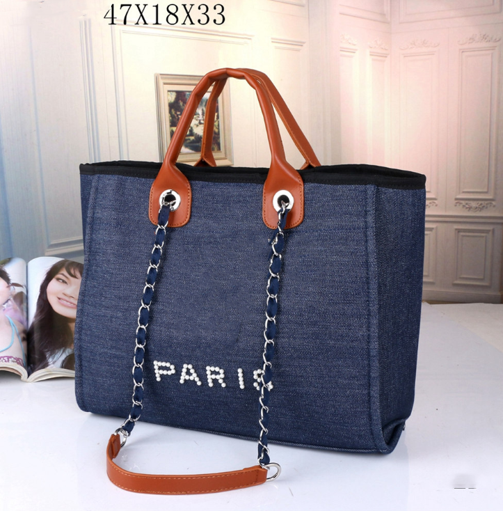 luxury Handbag Women's beach designer Oblique Skill Handbag shoulder embroidery large capacity embroidery shopping Tote, 47*18*33cm
luxury Handbag Women's beach designer Oblique Skill Handbag shoulder embroidery large capacity embroidery shopping Tote, 47*18*33cm