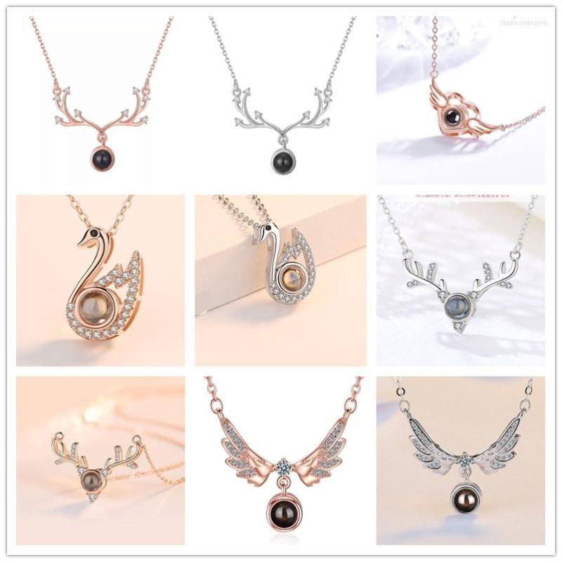 Pendant Necklaces Projection One Hundred Languages I Love You Necklace For Women Reindeer Horns Crystal Wedding Jewelry Wholesale 2023
Pendant Necklaces Projection One Hundred Languages I Love You Necklace For Women Reindeer Horns Crystal Wedding Jewelry Wholesale 2023