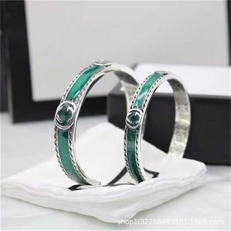 2023 Designer New Fashion jewelry Gujia 925 Silver Double letter interlocking green enamel pattern piping bracelet fashion men's and women's couple Bracelet 
2023 Designer New Fashion jewelry Gujia 925 Silver Double letter interlocking green enamel pattern piping bracelet fashion men's and women's couple Bracelet