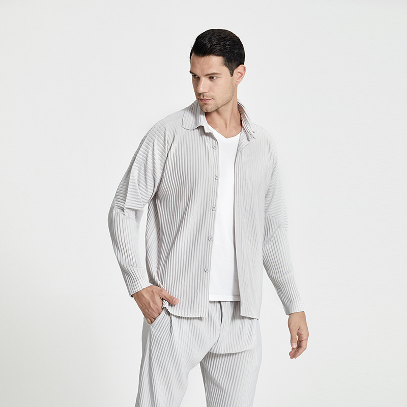Men's Casual Shirts Miyake pleated casual suit jacket Korean version loose summer long-sleeved shirt button top men 230320