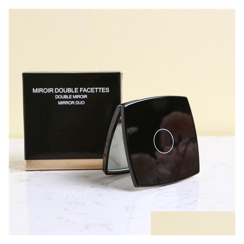 Mirrors Compact Folding Women Fashion Designer Black Portable Makeup Mirror Smooth Doublesided Cosmetic For Travel Make Up Drop Deli Dhdlx
Mirrors Compact Folding Women Fashion Designer Black Portable Makeup Mirror Smooth Doublesided Cosmetic For Travel Make Up Drop Deli Dhdlx