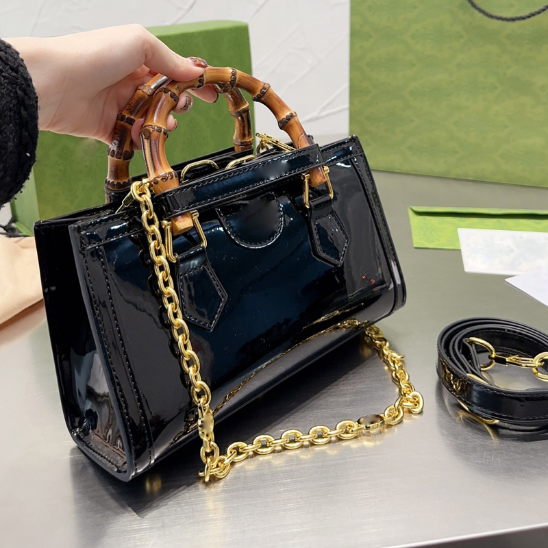 Bamboo Totes Bag Women Designer Handbags Purse Patent Leather Chains Cross Body Shoulder Bags Removable Double Shoulder Strap Top Bamboos Handle
Bamboo Totes Bag Women Designer Handbags Purse Patent Leather Chains Cross Body Shoulder Bags Removable Double Shoulder Strap Top Bamboos Handle