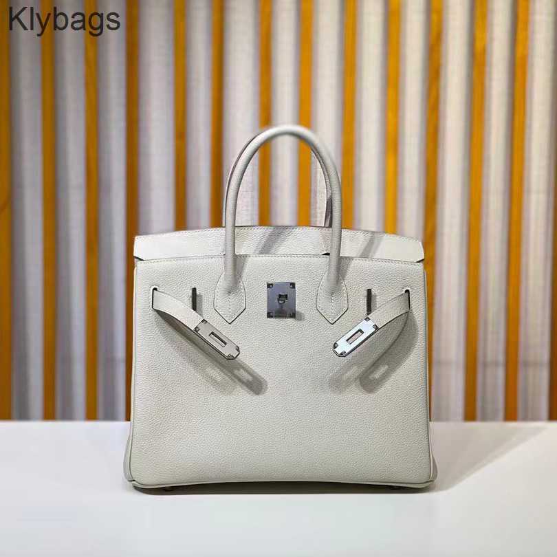 Buckle Bags Designer Pattern Women's Siver Bag 2023 Togo Litchi Thread Leather Birkins Handbag Wax Handbags 8ou3, Gold brown (gold )
Buckle Bags Designer Pattern Women's Siver Bag 2023 Togo Litchi Thread Leather Birkins Handbag Wax Handbags 8ou3, Gold brown (gold )