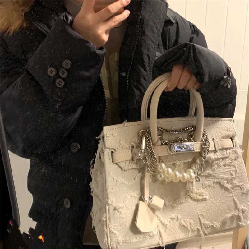 Designer Bags Herms Birkins Handbags A small number of hand-made denim stitching beggars' Military Canvas Kelly hand trendy women, 30cm beige pearl chain upgrade
Designer Bags Herms Birkins Handbags A small number of hand-made denim stitching beggars' Military Canvas Kelly hand trendy women, 30cm beige pearl chain upgrade