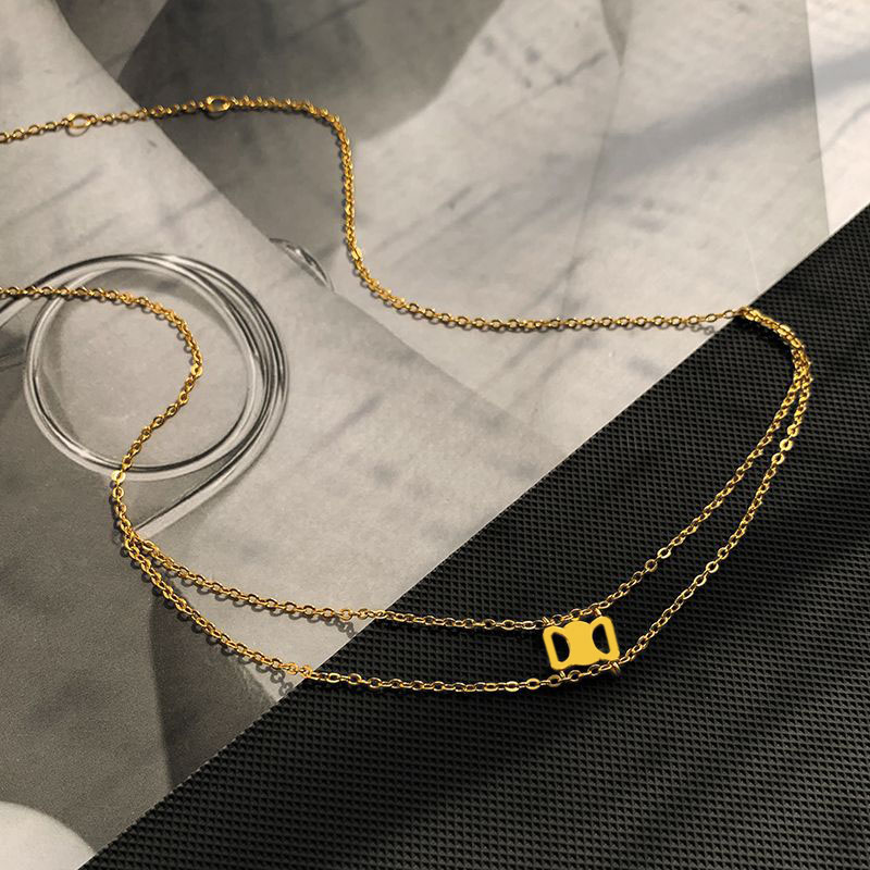Gold plated long womens love Triangle necklace simple style double deck ins elegant pendant necklaces luxury thin chain brass dangle designer bracelets hip hop
Gold plated long womens love Triangle necklace simple style double deck ins elegant pendant necklaces luxury thin chain brass dangle designer bracelets hip hop